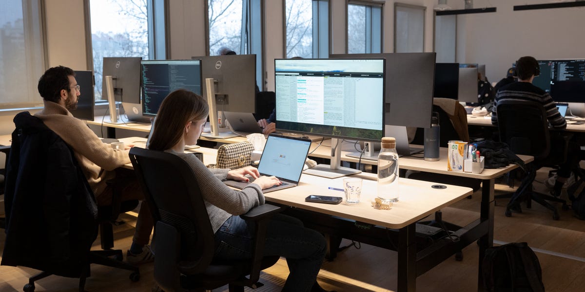 A Cambridge professor said companies aren't cutting jobs because of AI — but because they're too afraid to make big HR decisions amid uncertainty.