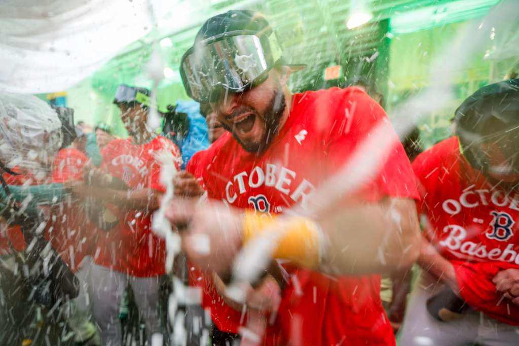 It was a wild scene inside the Red Sox clubhouse after the team clinched its first playoff berth in four years. Here's a look into the celebration that followed Friday's walk-off win.