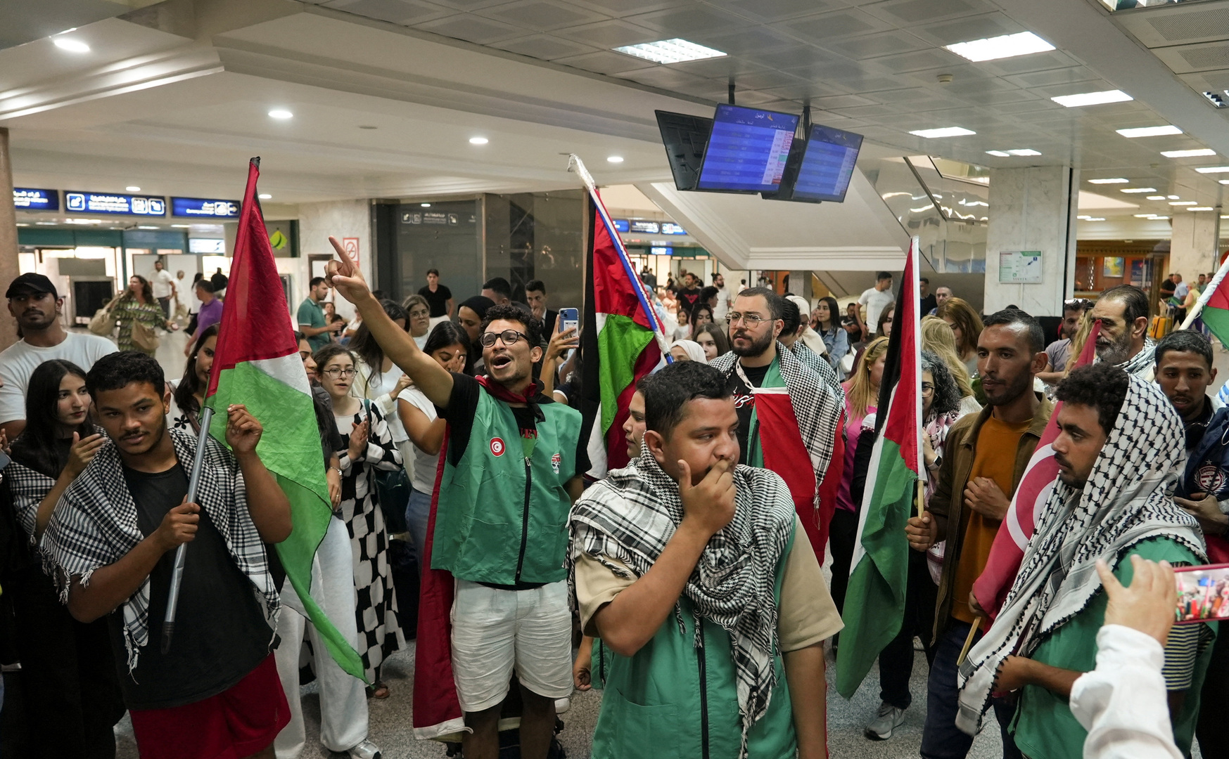 Dozens of activists detained aboard the Gaza aid flotilla have arrived home in Spain, Portugal, and Tunisia.