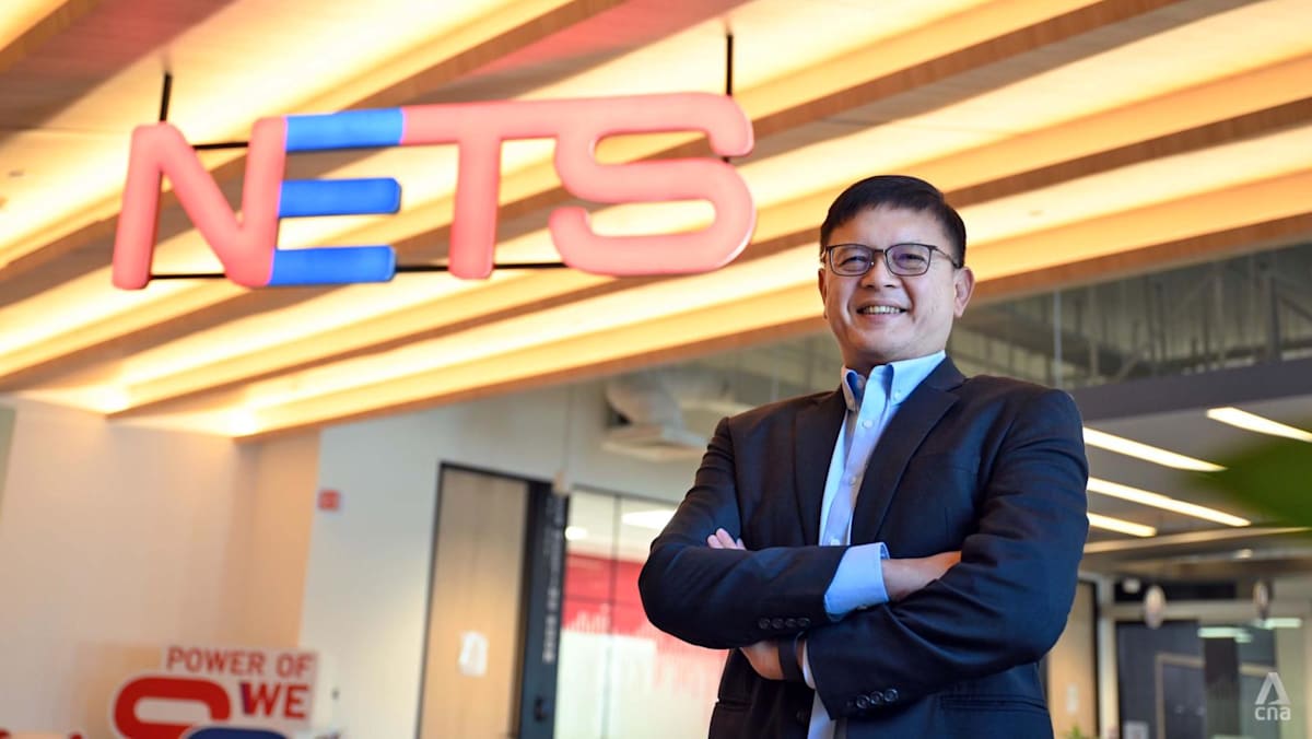 Group CEO of NETS Lawrence Chan tells CNA how it tries to win over customers who have a plethora of payment options available to them.