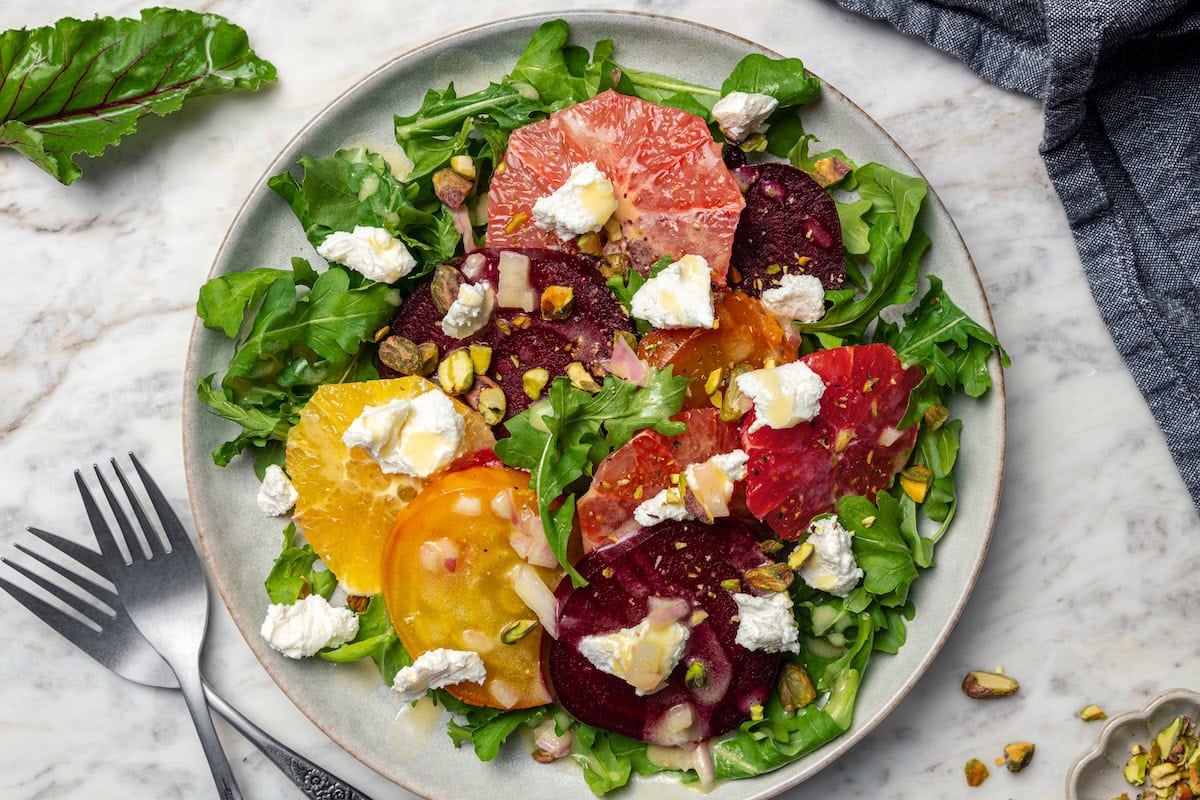 Festive enough for a holiday but simple enough for a light weeknight meal, this Roasted Beet and Citrus Salad pairs tender baked beets with creamy goat cheese, bright citrus and pistachios, all atop a bed of peppery arugula. It’s a show-stopper! Roasted Beet …
