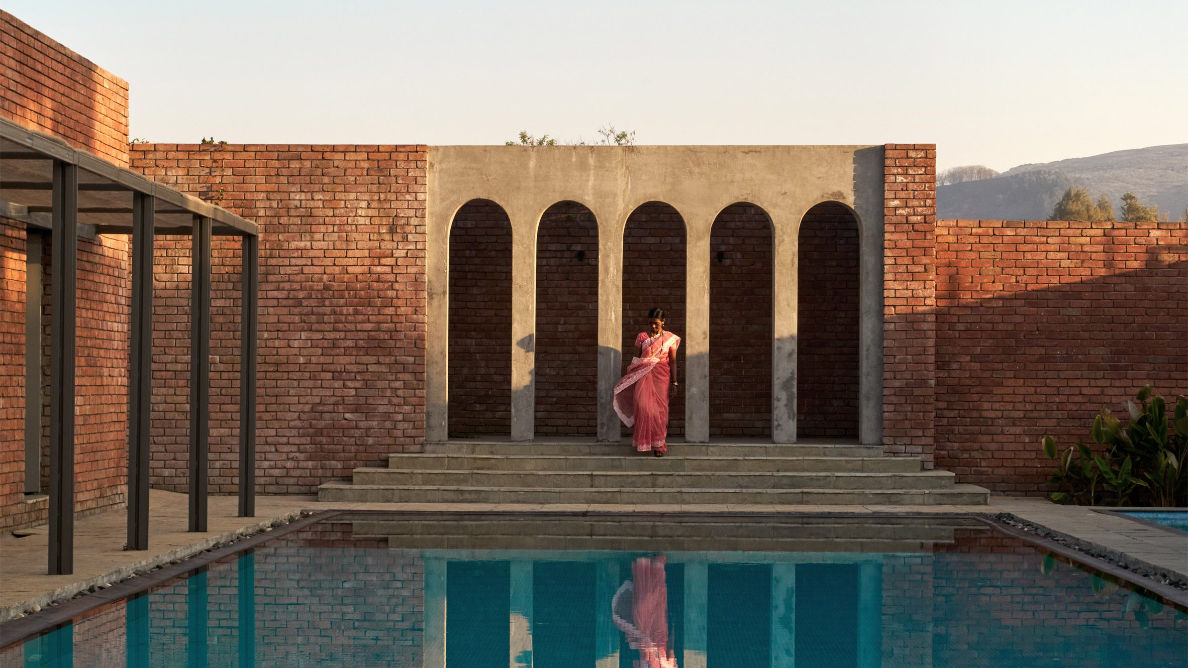 Perforated brick walls, courtyards and arcades are intended to imitate the bylanes of an Indian city at The Street, a community clubhouse in Pune, India, designed by local practice Studio VDGA. The Street was created to provide facilities and communal gatheri…
