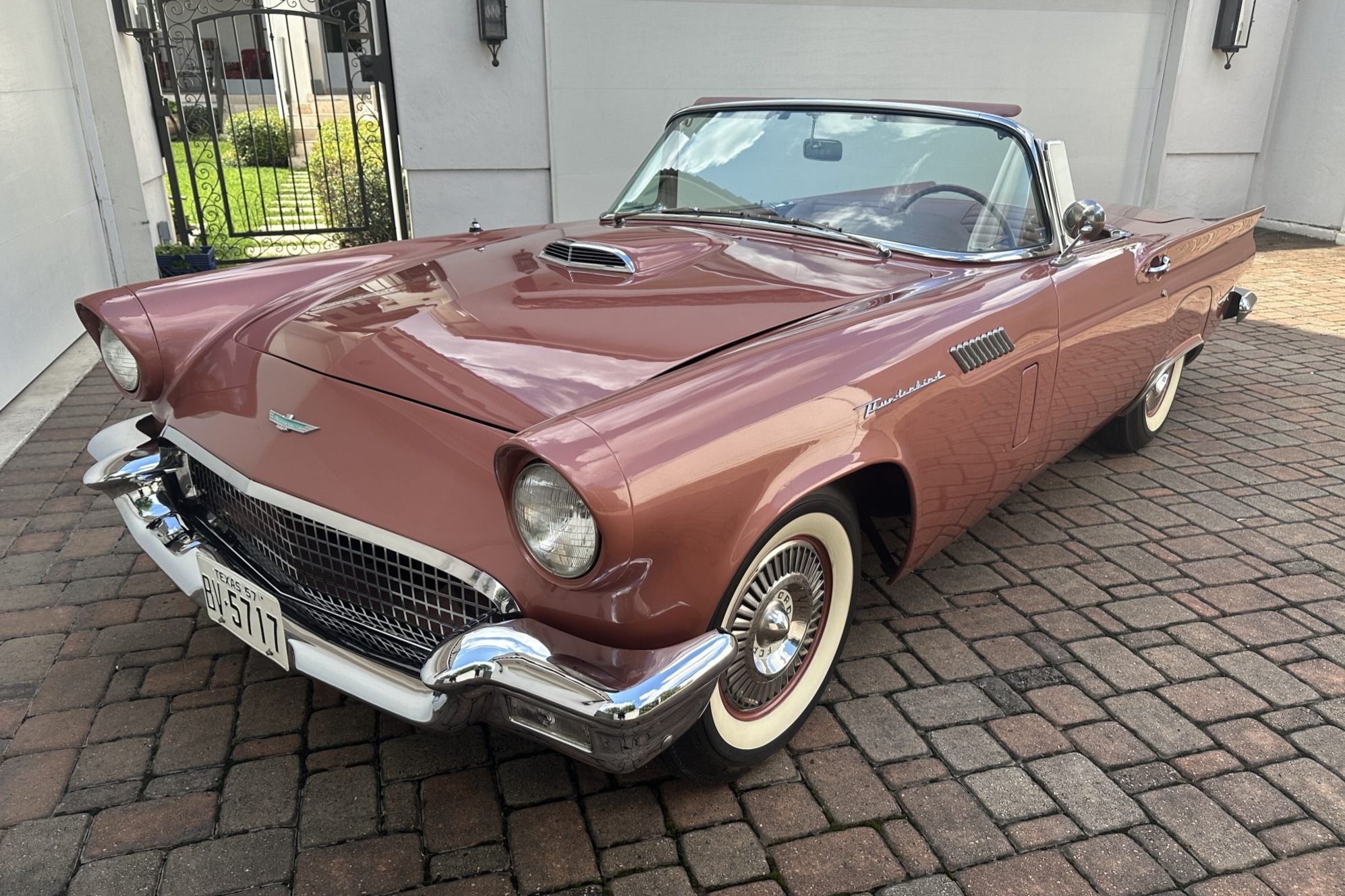 This 1957 Ford Thunderbird is finished in bronze over matching vinyl upholstery and is powered by a 312ci V8 paired with a three-speed automatic transmission. Equipment includes power steering and brakes, a Holley four-barrel carburetor, Mummert high-ratio ro…