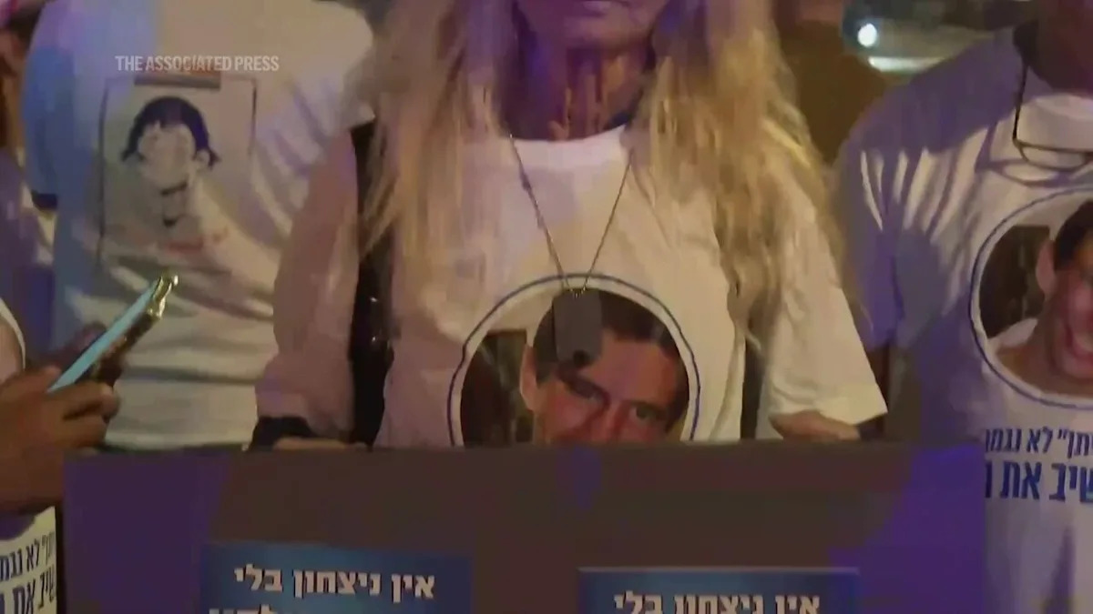 A police-escorted convoy transported the remains of a hostage in Gaza that Hamas says are of an Israeli soldier who was killed in 2014 to Tel Aviv's forensic...