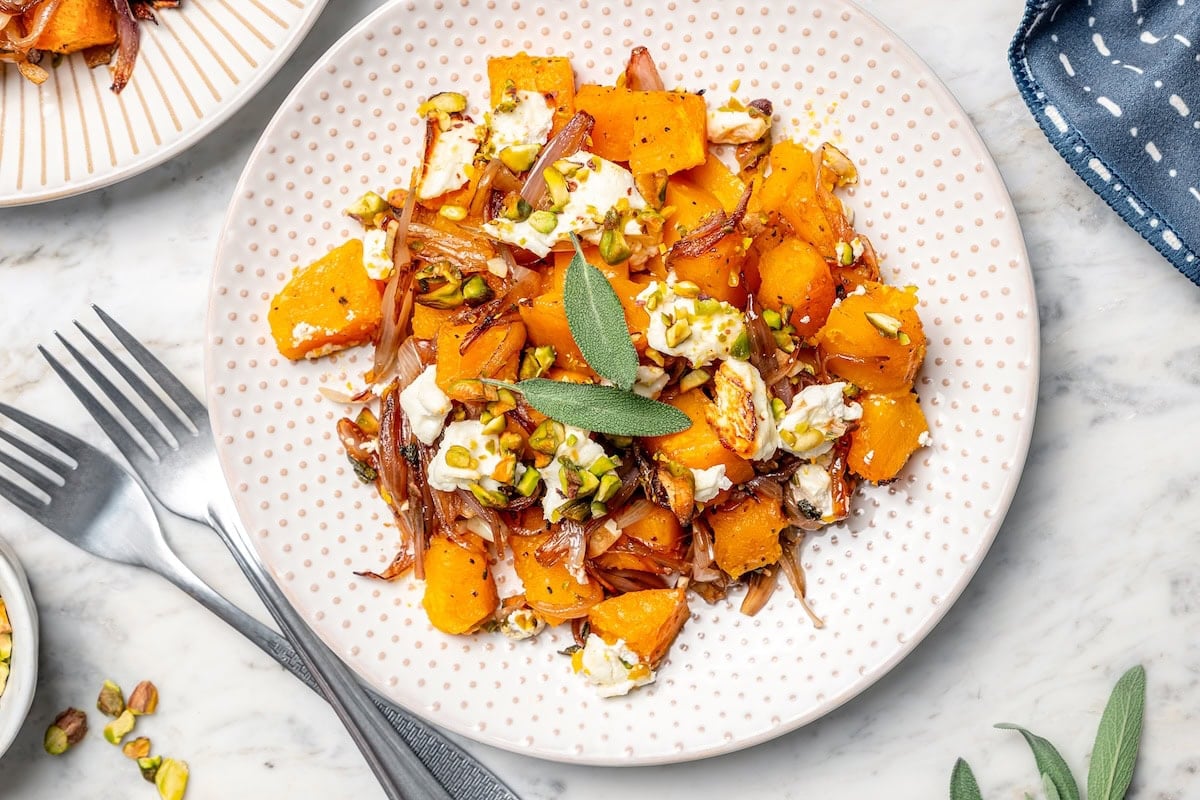 Baked butternut squash is layered with creamy goat cheese and crunchy pistachios in this cozy Butternut Squash Bake recipe. A restaurant-worthy side dish that’s perfect for the holidays and for weeknights when you feel like something fancy! Baked Butternut Sq…
