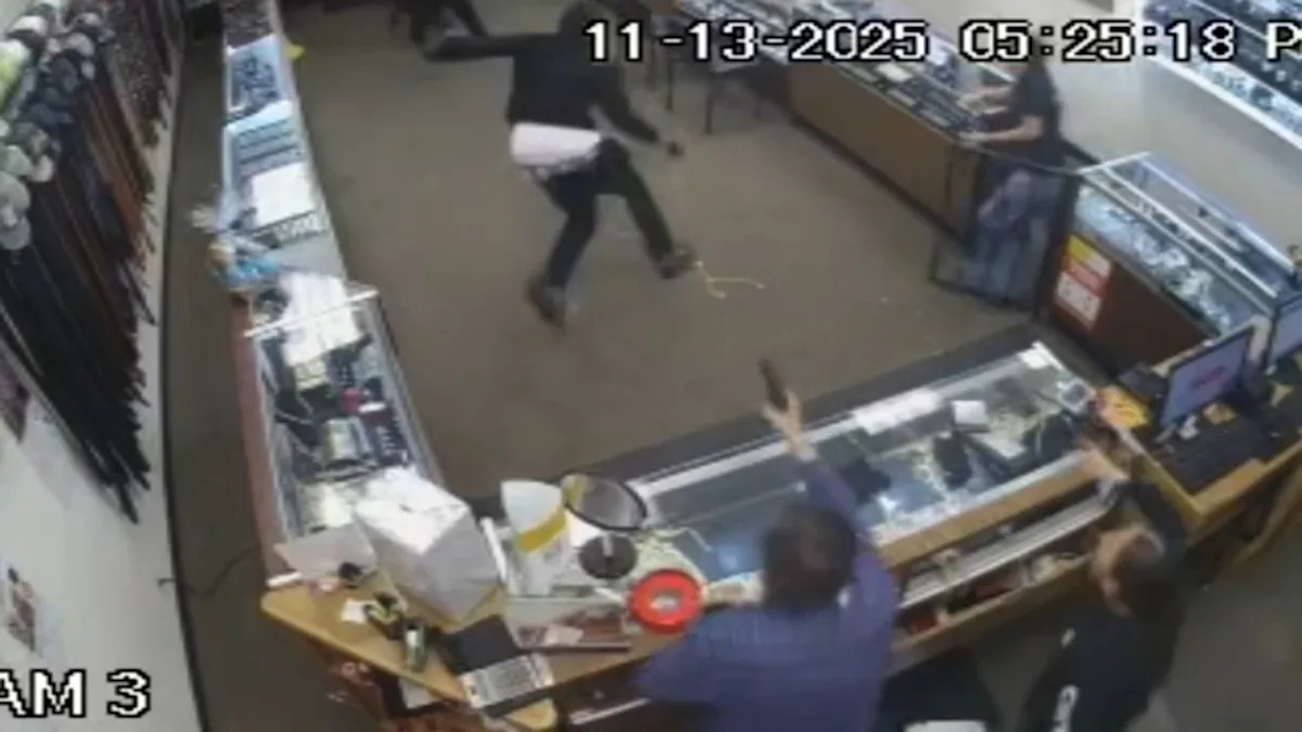 Surveillance video captured the tense moments as a group of masked robbers broke into a Madera jewelry store, leading to its owner opening fire.
