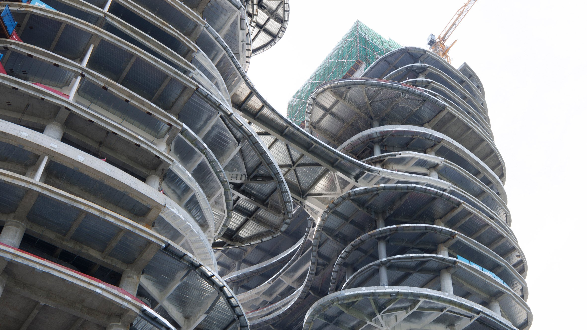 UK studio Zaha Hadid Architects has released photos of a sinuous high-rise building under construction in Shenzhen, which is set to become the headquarters for education charity Chen Yidan Foundation. The Yidan Center, which has topped out, features two tower…