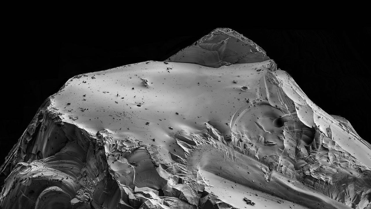 Lunar impact glass becomes a mighty mountain in new 'Nanocosmos: Journeys in Electron Space' images (exclusive)