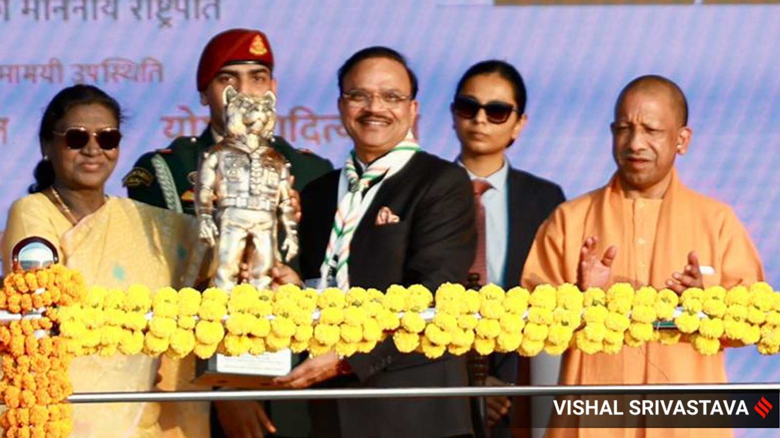 Says along with the spirit of competition the spirit of cooperation is a must for strengthening the nation and society