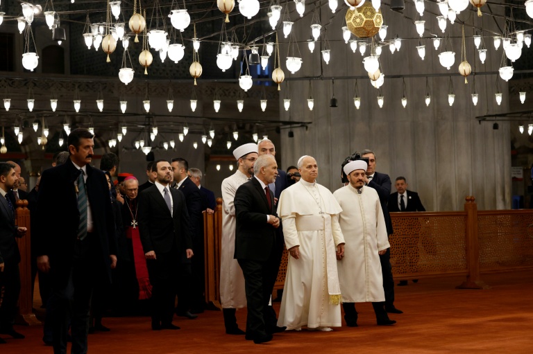 Thousands of worshippers battled the rain to join Pope Leo XIV as he celebrated mass in Istanbul on Saturday, the last full day of his visit to Turkey.&nbsp;"It's...