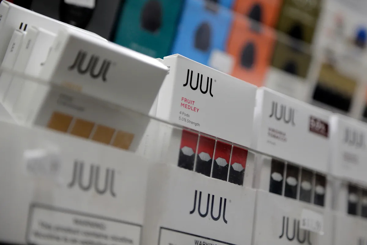 The Food and Drug Administration is allowing vaping brand Juul to keep its e-cigarettes on the market, providing relief to a company that has struggled for...