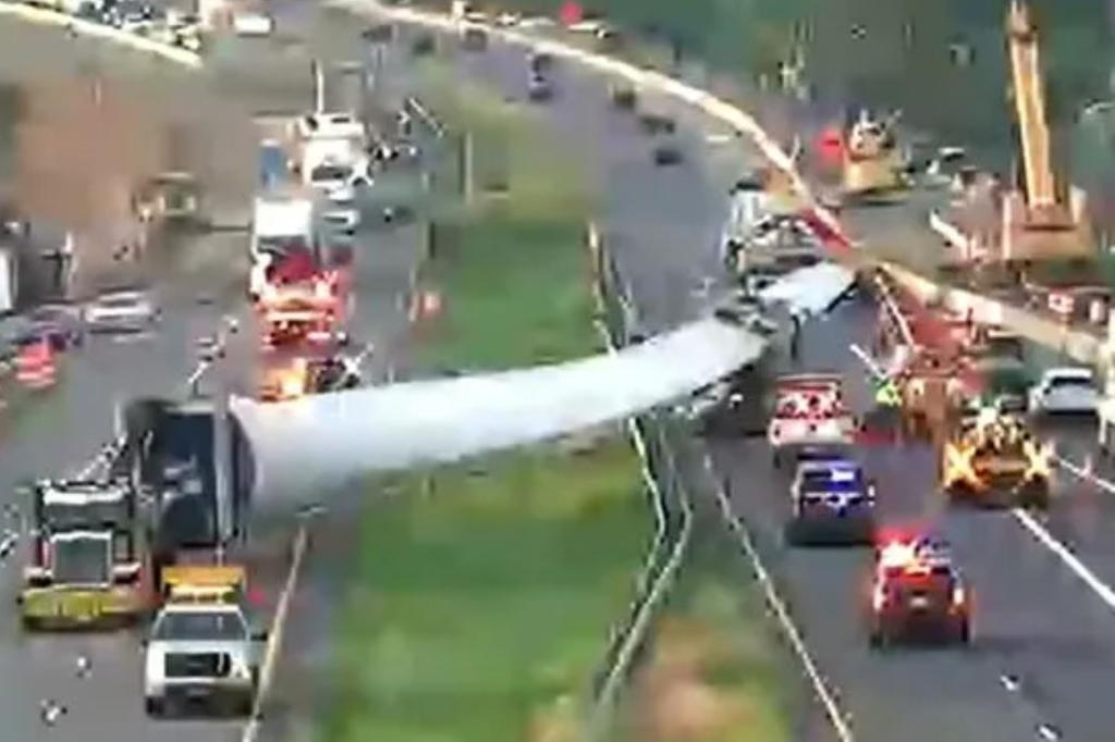 One person is reported injured after a wind turbine blade broke loose from a truck and crashed into traffic on Interstate 70 in Maryland.