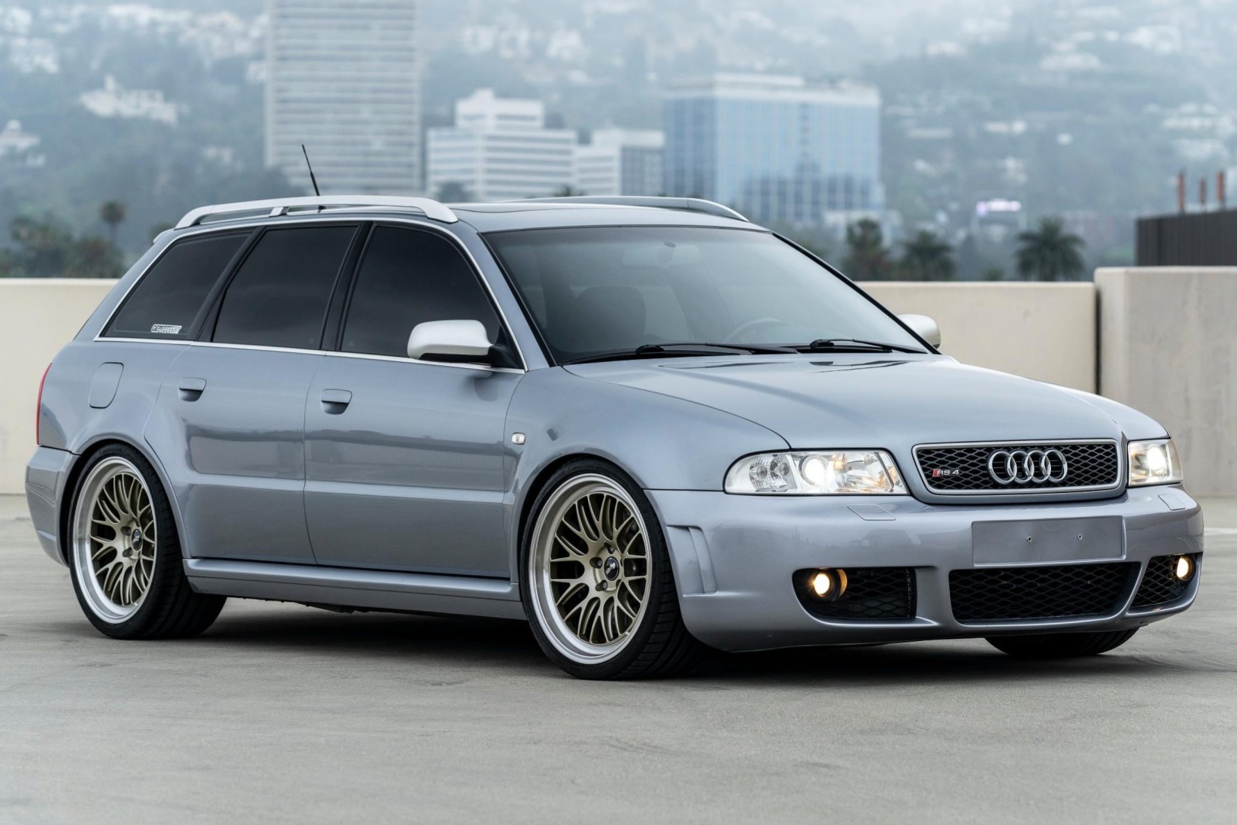 This 2000 Audi RS4 Avant spent time in Switzerland before it was acquired by the seller and imported to the US in 2025. Finished in Avus Silver Pearl Effect over Onyx Valcona leather, the car is powered by a twin-turbocharged 2.7-liter V6 linked with a six-sp…