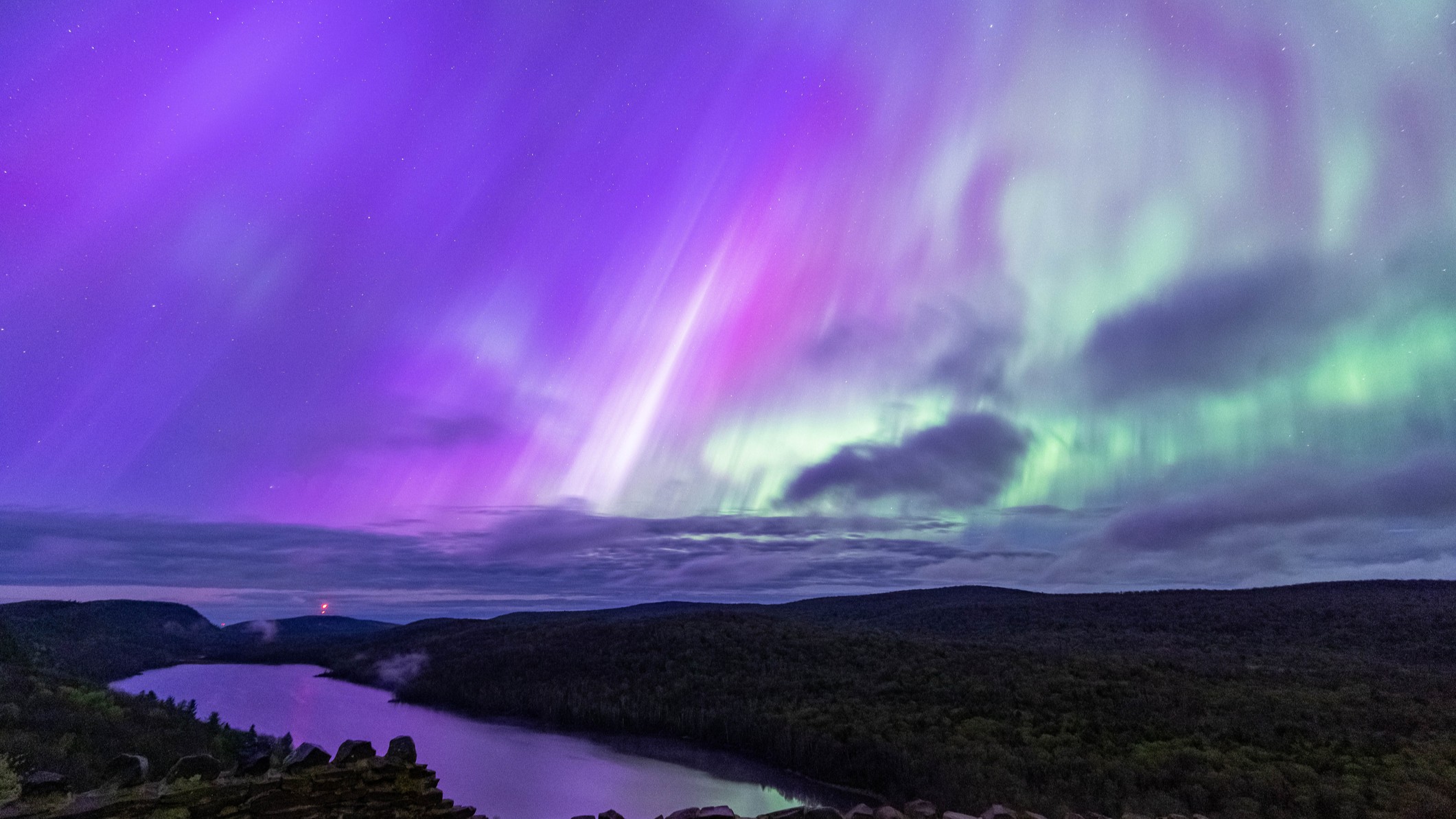 A pair of solar eruptions may combine into a powerful "cannibal CME," boosting chances for dazzling auroras over Labor Day.