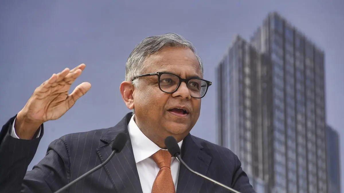 Tata Sons Chairman N Chandrasekaran urges industry-government collaboration to leverage AI for economic growth and empowerment in India.