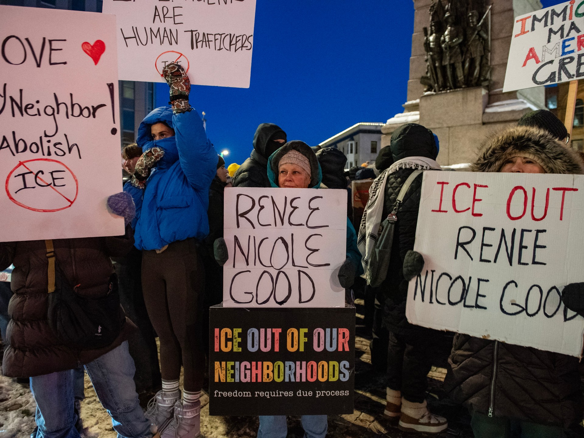 Protesters march in icy conditions against Trump administration's anti-immigration policies, demanding ICE leave city.