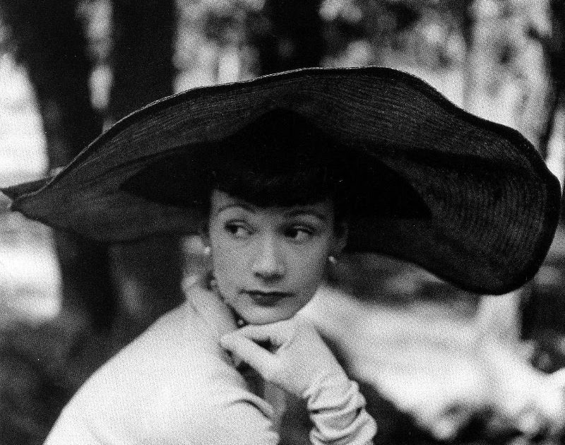 Gérard Albouy (1912–1985) was a prominent French artist and milliner who left an indelible mark on the world of mid-century fashion and visu...