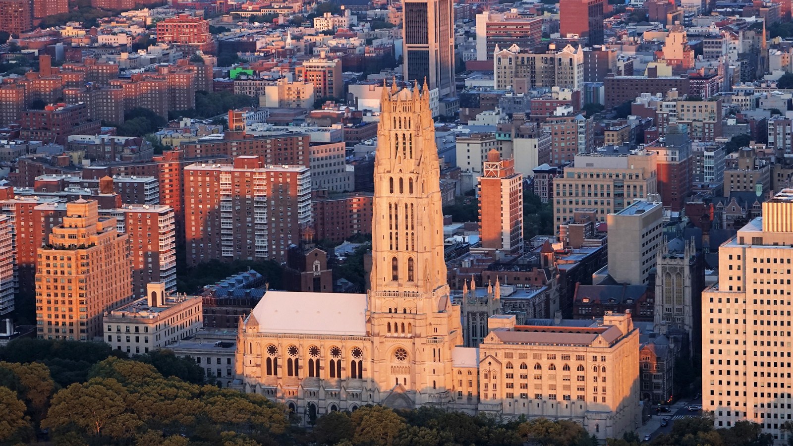 More than two dozen men are suing iconic church over claims it ignored decades of abuse by its by its multi-millionaire basketball coach