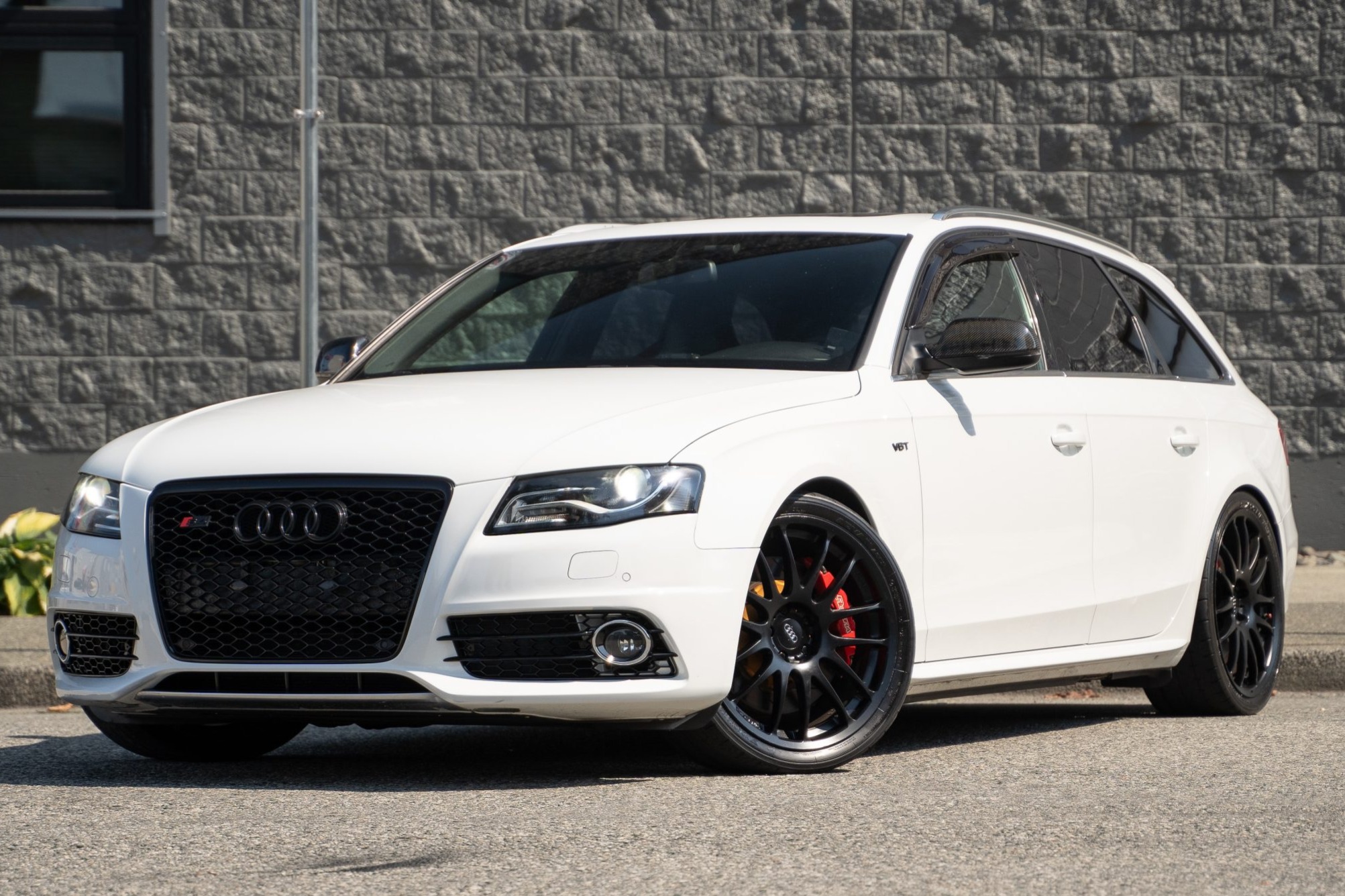 This 2010 Audi S4 Avant Prestige is a Japanese-market example with left-hand drive, and it has 70k kilometers (~43k miles). It is finished in Ibis White over Black and Magma Red Silk Nappa leather and is powered by a supercharged 3.0-liter V6 that drives all …