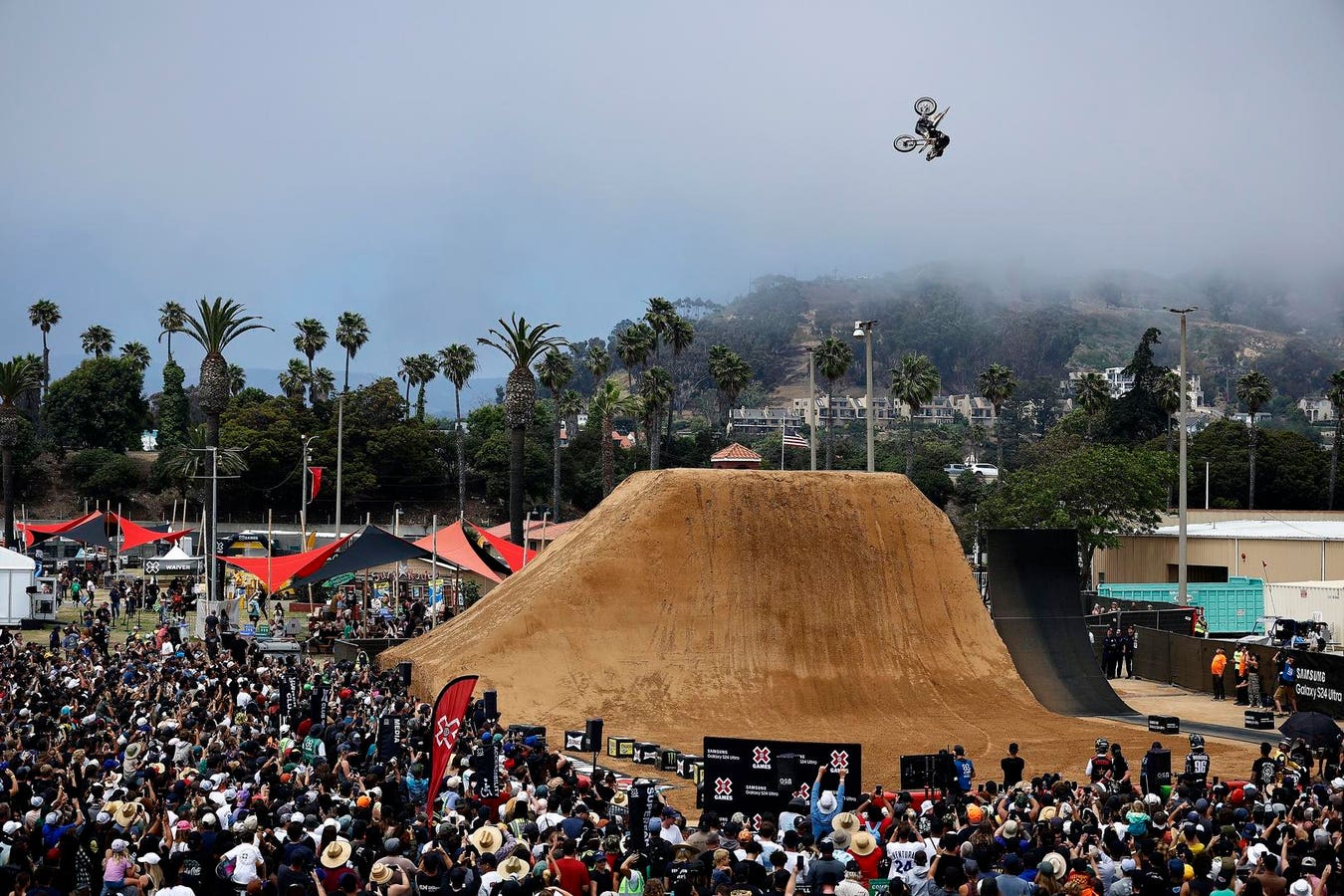 The newly launched X Games League announced its first four city franchises, on three continents, and a name sponsor as it wrapped up its last stand-alone event.