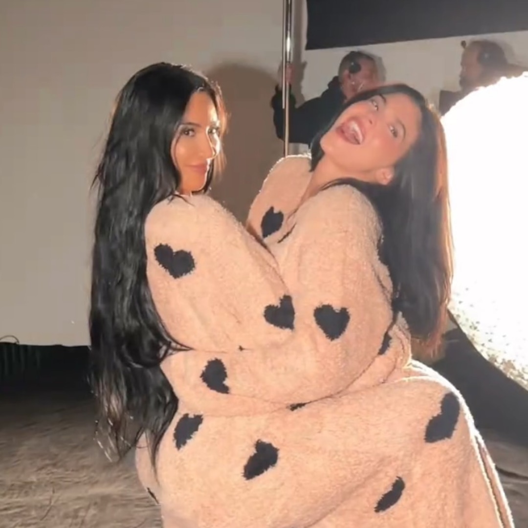 Sisters supporting sisters.
Kim Kardashian surprised Kylie Jenner during her photo shoot for the new SKIMS Everyday Cotton campaign, and her reaction was priceless.
"We are going to go next door...