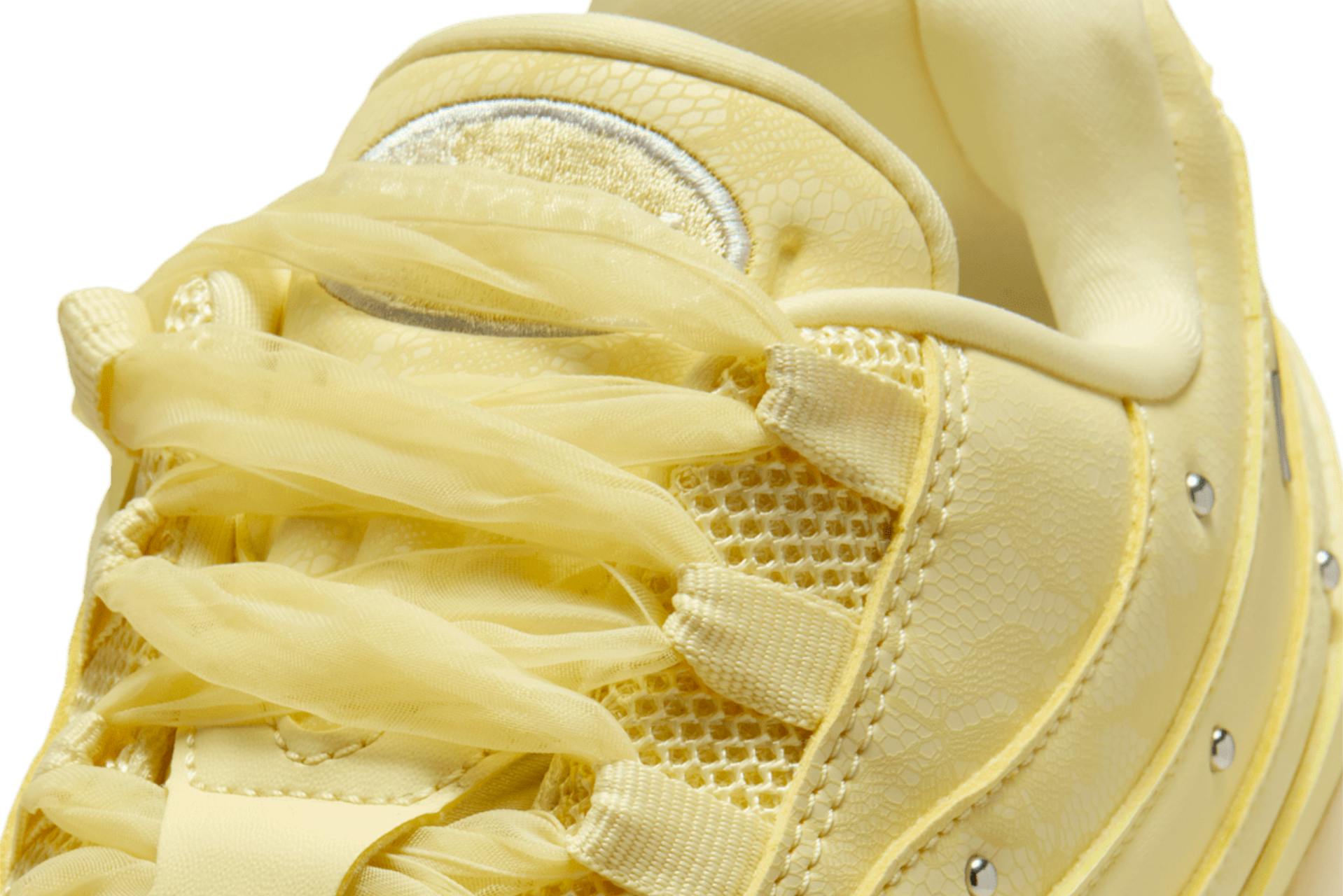 Nike's Air Max 95 "Soft Yellow" sneaker lands just in time for spring, offering a season-worthy butter yellow design & studded details.