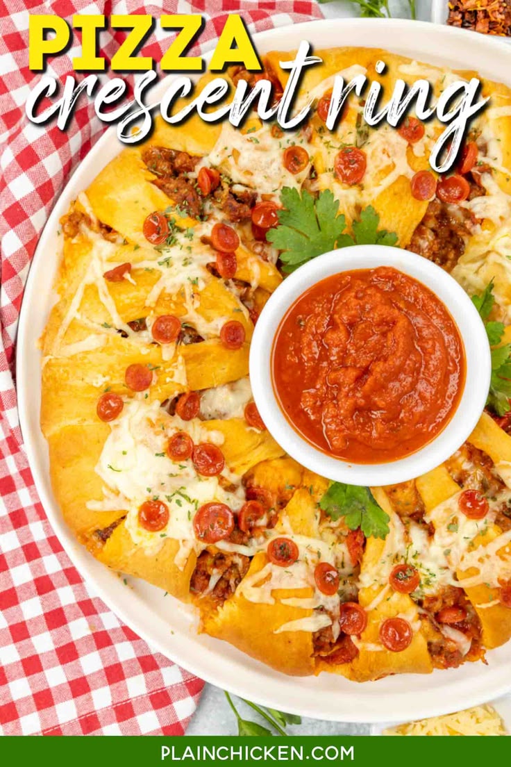 This Pizza Crescent Ring is the ultimate crowd-pleaser for your next pizza night!  Flaky, buttery crescent rolls are stuffed with zesty pepperoni, savory sausage, pizza sauce, and tons of gooey melted mozzarella cheese.
​
​It’s a quick and easy dinner idea …