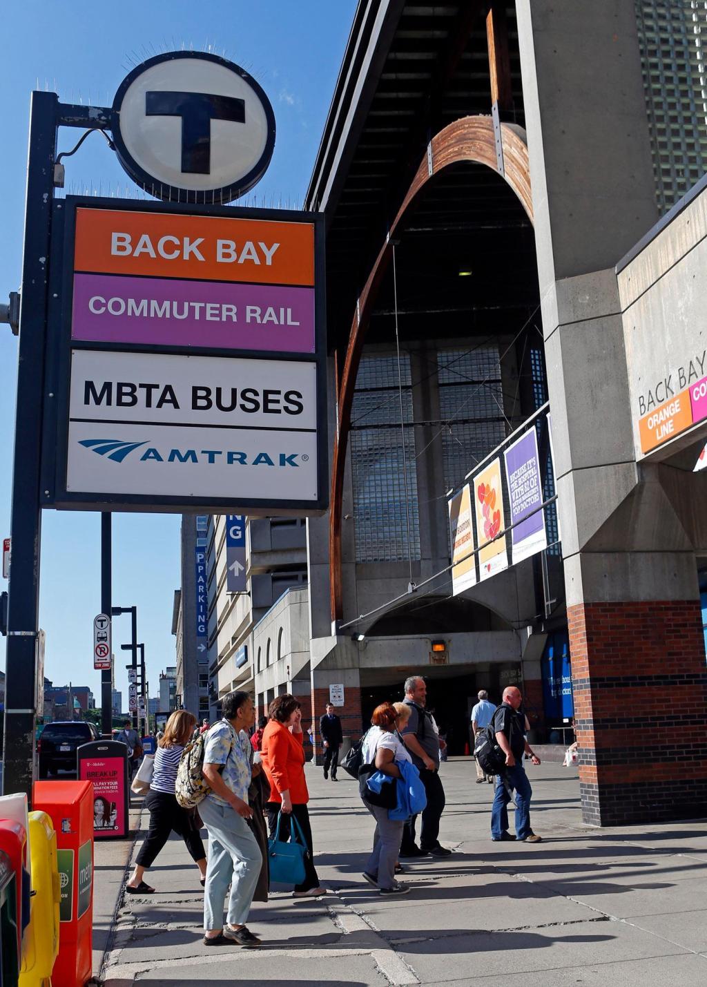 A 27-year-old man was injured after allegedly being kicked into a train by a group of teens at the MBTA Back Bay station on Tuesday.
