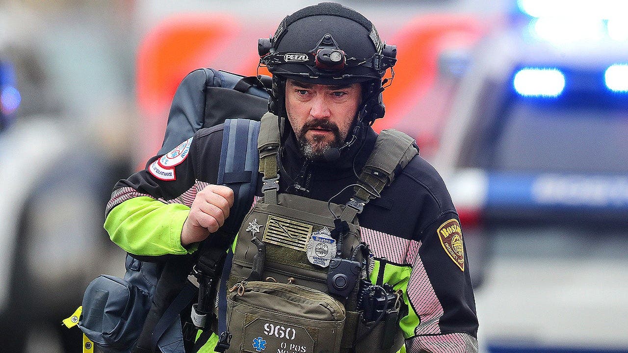 Boston's mental health-first crisis response model faces scrutiny after police say a man emerged with a sword and stabbed an officer on Saturday.