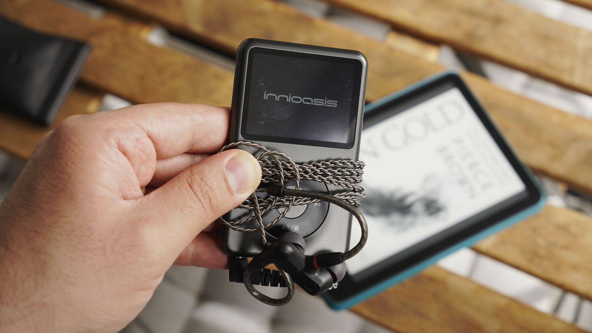 I ditched music on my phone for this cheap MP3 player — and two weeks on, I wish I'd done it sooner