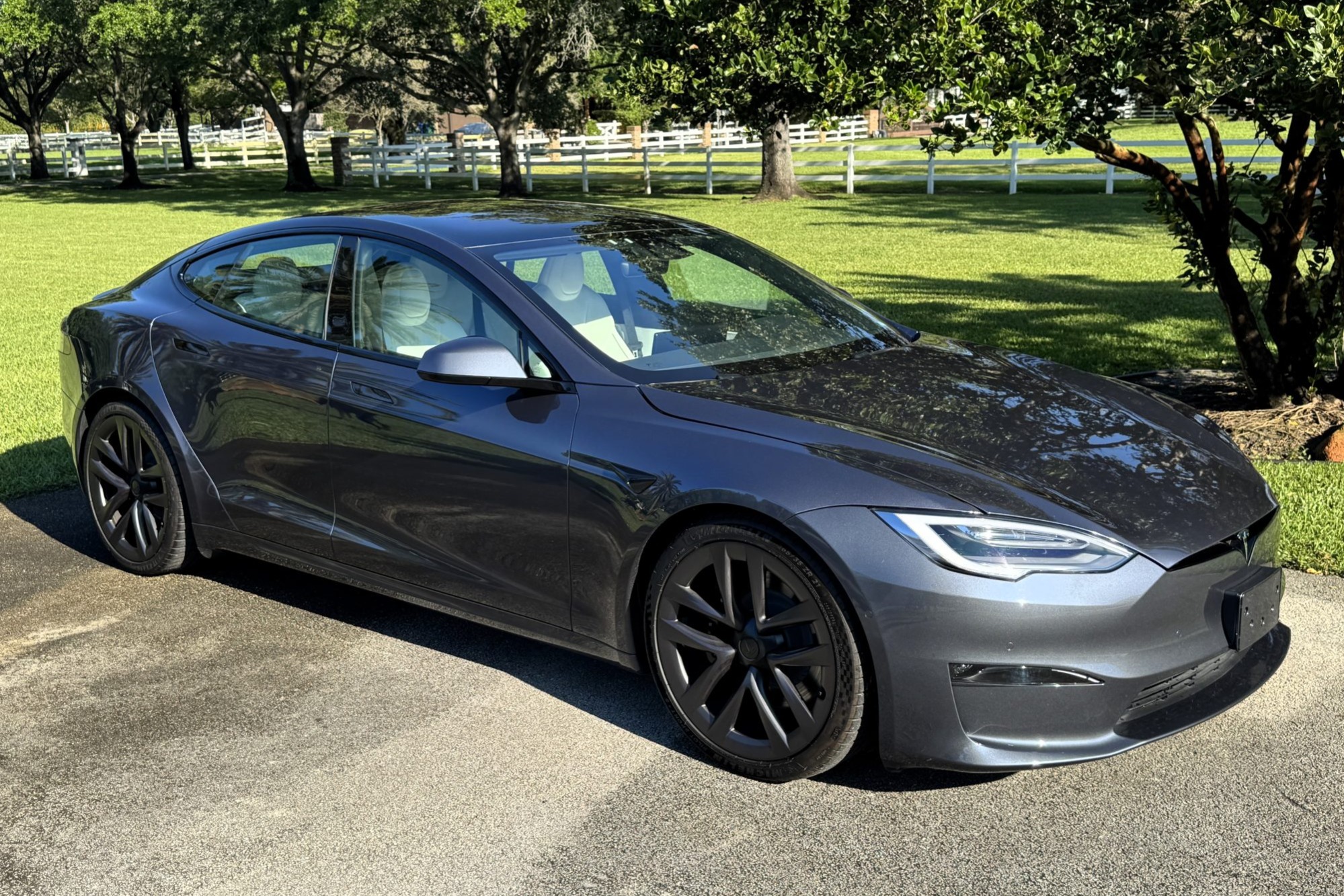 This 2022 Tesla Model S Plaid had one Bay Area-based owner who covered less than 500 miles in the car prior to the selling dealer's 2026 acquisition. It is powered by a single front-mounted and dual rear-mounted three-phase AC induction motors driving all fou…