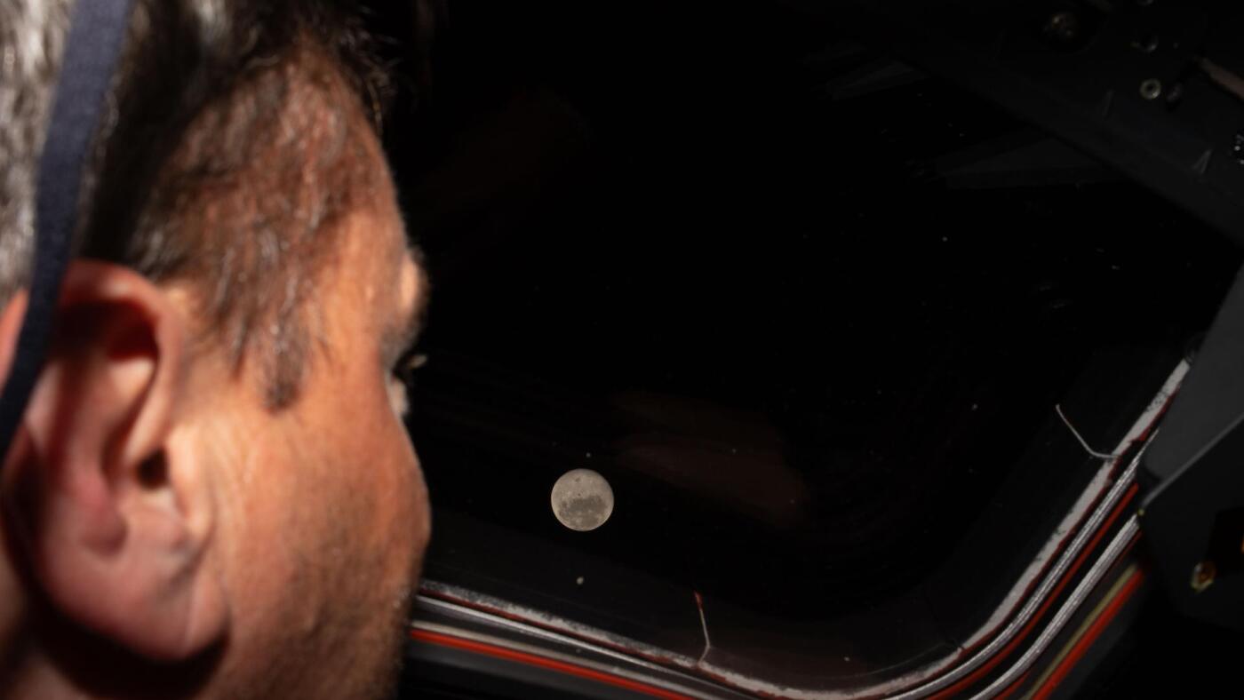 The NASA moon mission completed several key milestones as its crew looped around the lunar body. It's expected to splash down on Earth on Friday.