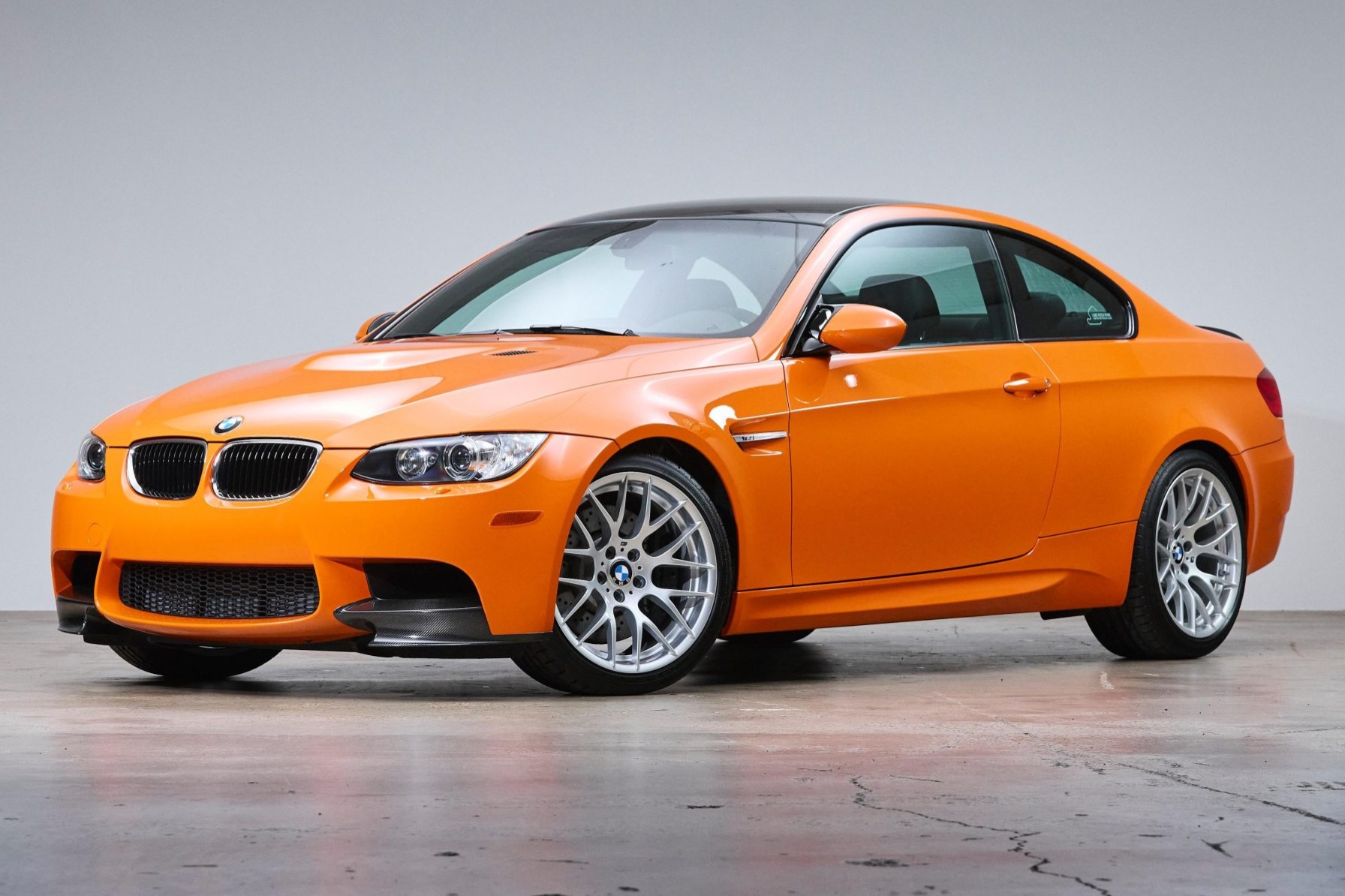 This 2013 BMW M3 coupe is one of 200 in the Lime Rock Park Edition, and it has 86 miles. The one-year-only edition specified Fire Orange paint and a naturally aspirated 4.0-liter S65 V8, and this example was optioned with a seven-speed dual-clutch transmissio…