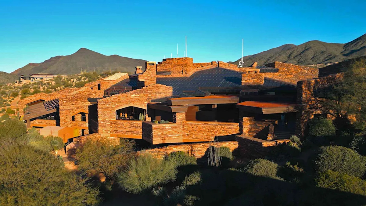 The main clubhouse at Desert Mountain in Arizona is a modernist stone marvel that blends seamlessly into its surrounds.
