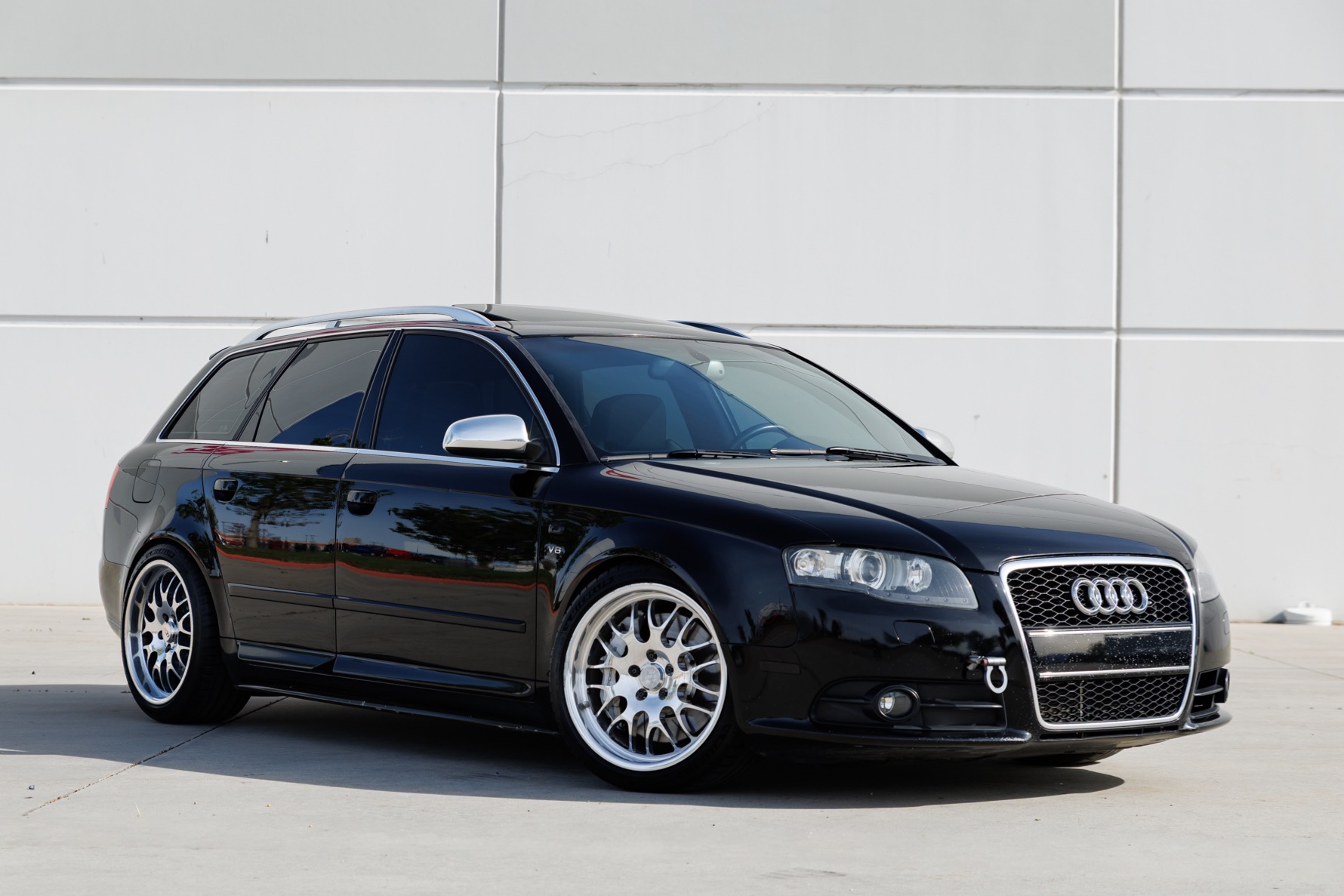 This Brilliant Black 2006 Audi S4 Avant is powered by a replacement 4.2-liter V8 assembled by JH Motorsports (JHM) of Lathrop, California. The shop built it with a Stage 1 supercharger in addition to JHM internal components, rebuilt cylinder heads, and a ligh…