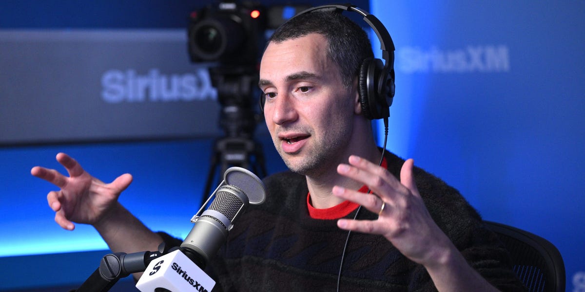 Jack Antonoff, a songwriter for Taylor Swift, criticized AI in music, defending traditional creative processes as a "holy" artistic ritual.