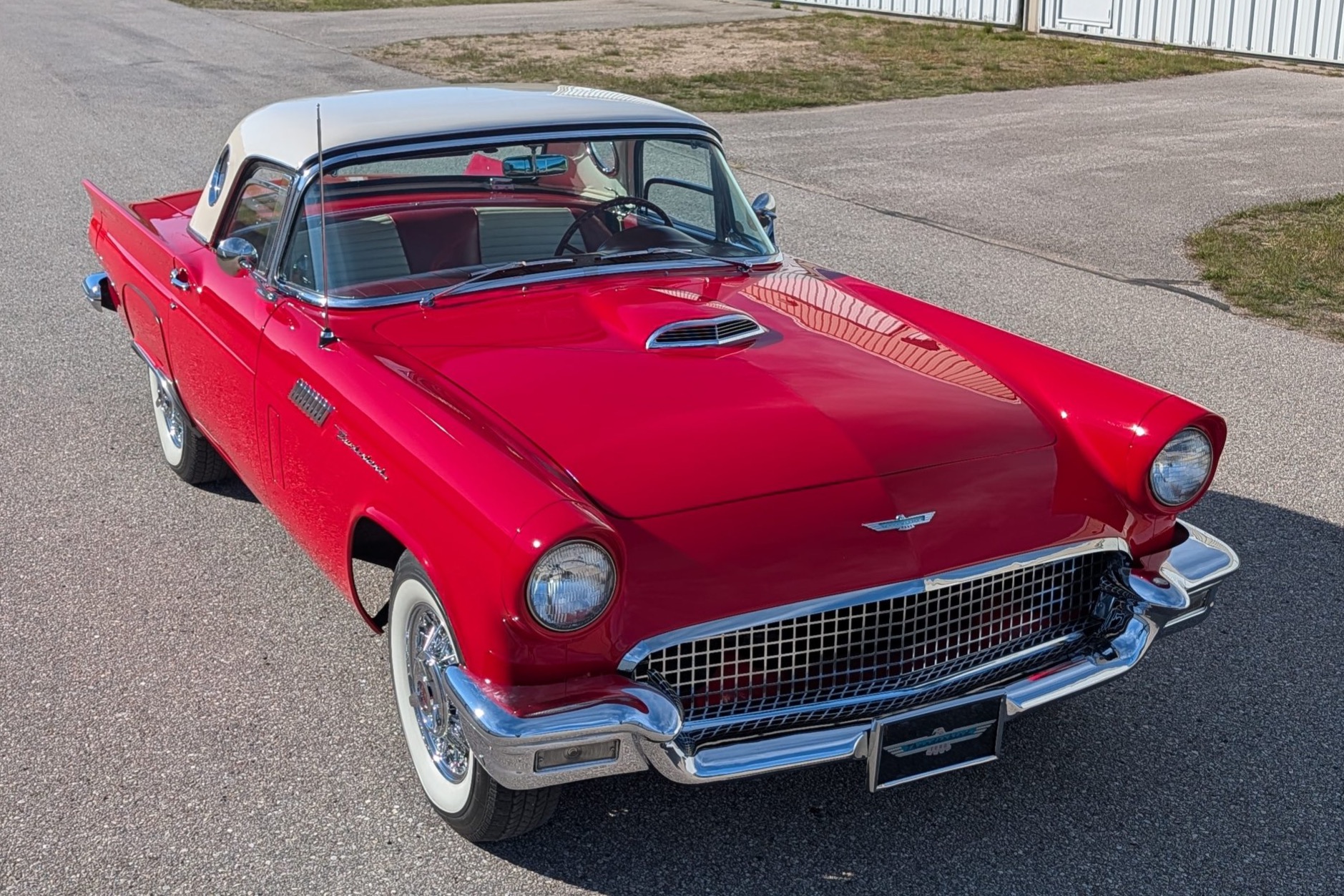 This 1957 Ford Thunderbird was acquired out of Canada by the current owner in 2020, and is said to have been refurbished circa 2010. It is powered by a 312ci V8 paired with a three-speed Fordomatic automatic transmission, and it is finished in red over red an…